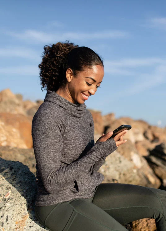 Patient at home using phone on a video consult